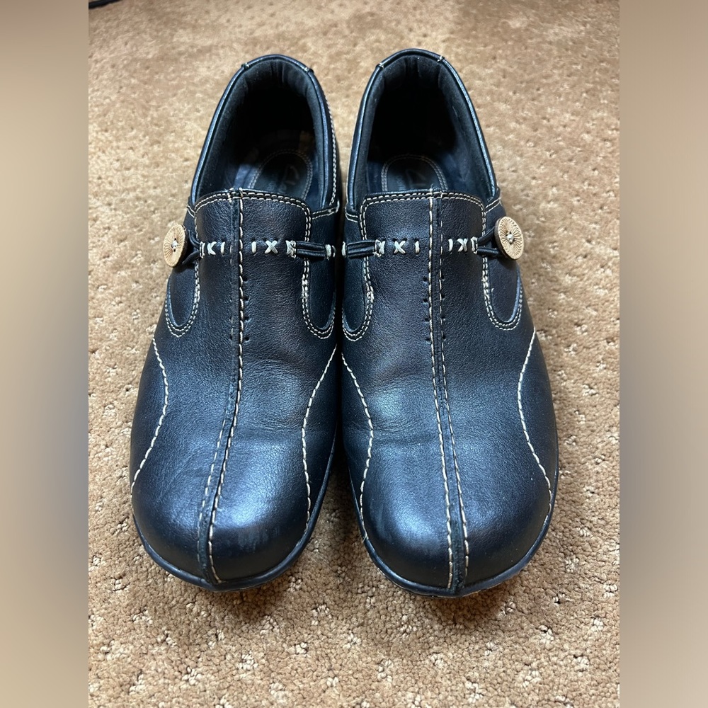 Clarks Dark Leather Loafers with Light Stitching